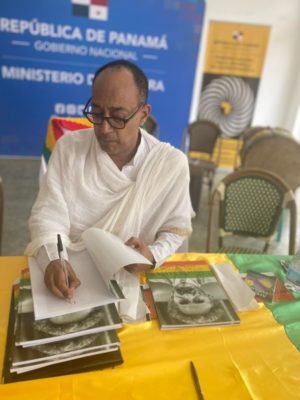 HIH Prince Ermias signing books
